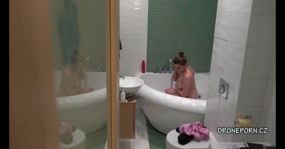 Chubby busty girl taking shower. hidden cam