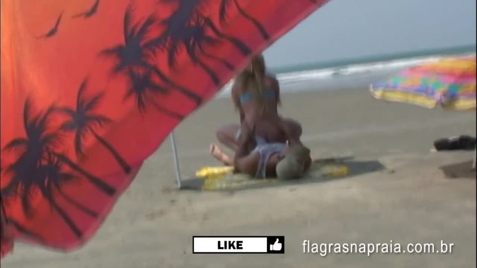 Brazilian couple having sex on the empty beach Public