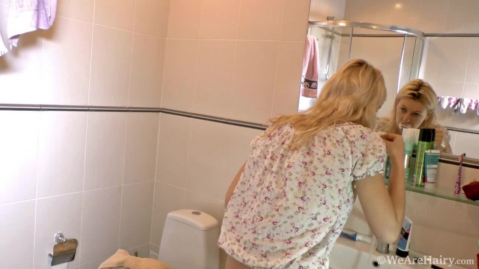 Hariy girl Fedora plays with her self in bathroom