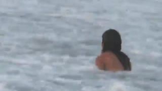 Playful girl at the  beach