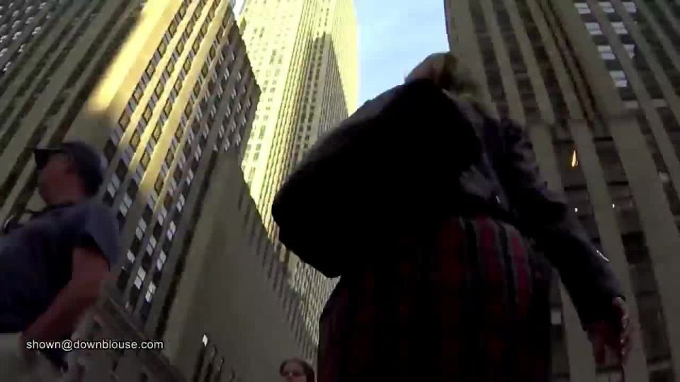 Business woman walking on the street of New York pantiless  1  280