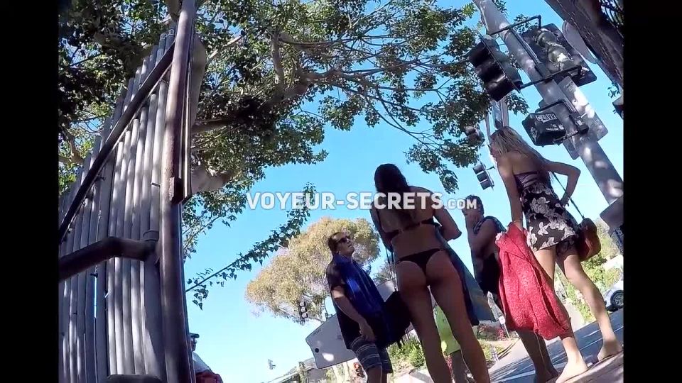 Asses in bikinis on the stairs that lead to the beach Nudism!