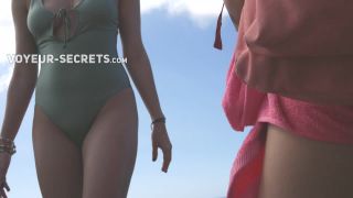 Wet swimsuit reveals hot pussy