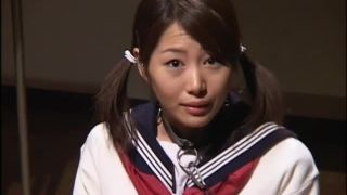 Asian college girl in uniform has her face streaked in s...