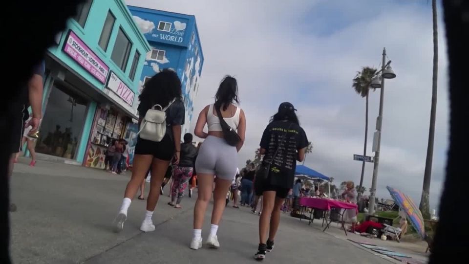 Big young bubble butt wiggles down the street