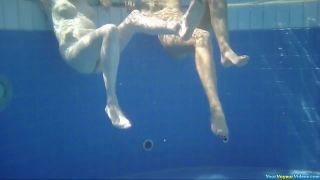 Two chicks naked in pool