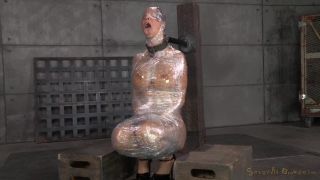Sexy Syren De Mer saran wrapped, mummified and shackled, ...