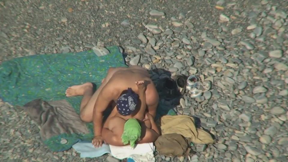 Nudists fuck on the beach