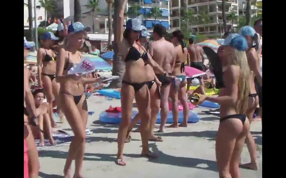 Bar girls dancing on the beach