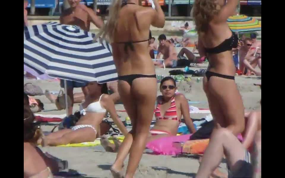 Bar girls dancing on the beach