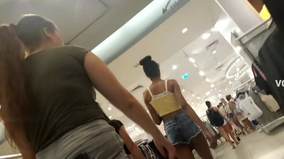 Skinny black girl and white teen at mall Voyeur