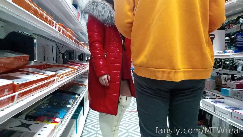 Exhibitionist wifeExhibitionist Wife red jacket  transparent dress in public store