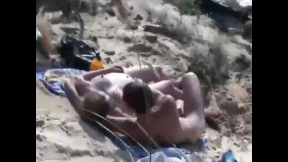 Voyeur secretly watches beach sex