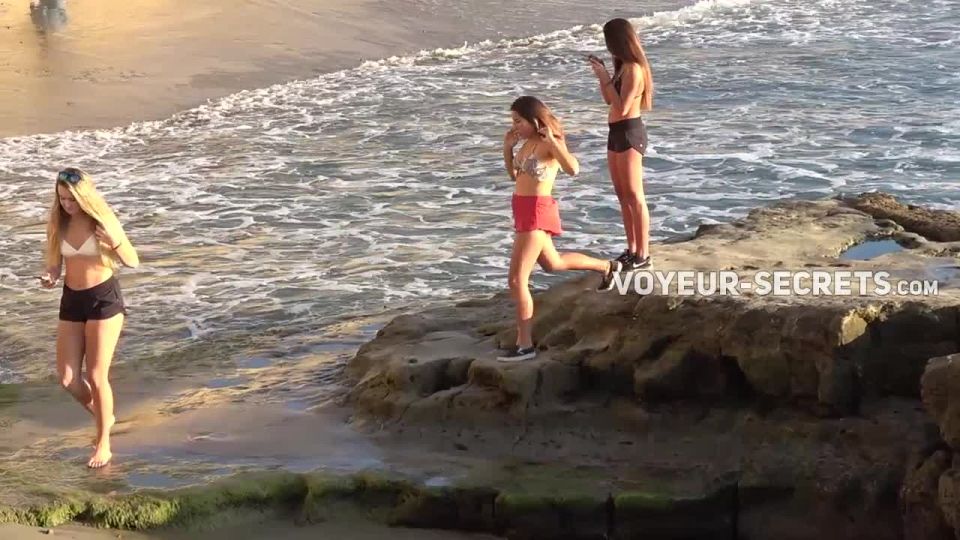 Teen girls making selfies on beach Voyeur