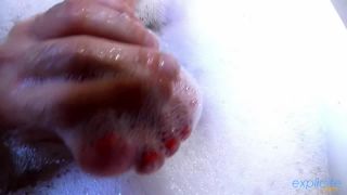 Funny busty French brunette teasing you in her bath