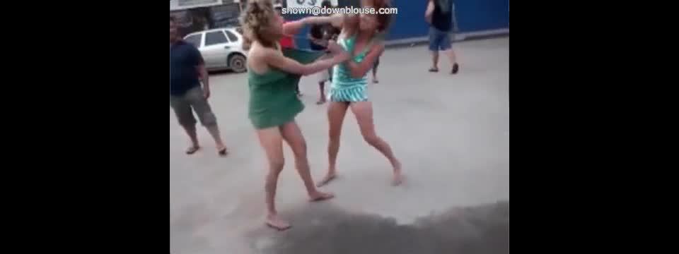 Girls fight naked on the  street