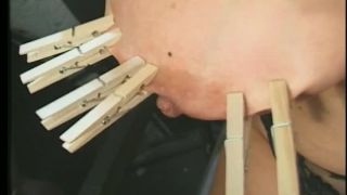 Dominatrix Tortures Some Natural Breasts