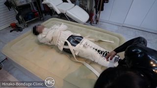 Hinako Bondage Clinic – Taped Down to the Bed in a Latex Cat Suit and Canvas Straitjacket - [Femdom porn]