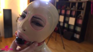 Getting spanked latex Doll Latex!