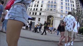 Tourist girl with terrific butt in loose  shorts