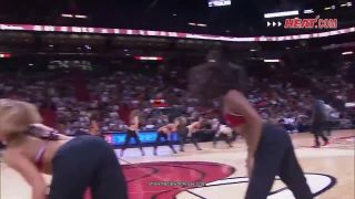 Black nipple pops out from Miami Heat's dancer  shirt