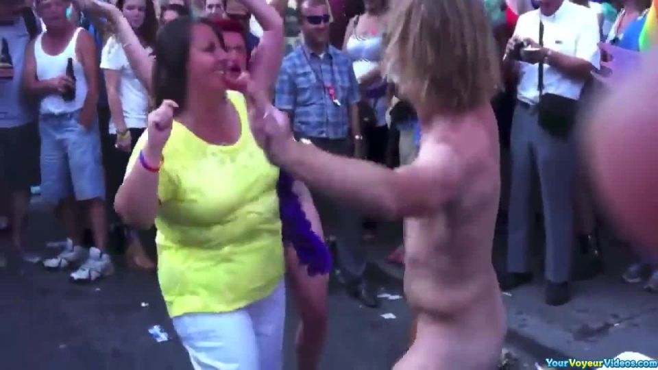 Naked and dancing in street