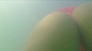 Pussy gets a touch and a rub in the water