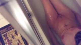 horny girl fingering pussy in the bathtub. hidden cam