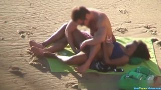 Interracial beach sex.