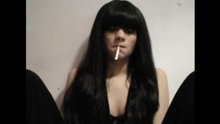 Long Haired Bitch Smoking A Cigarette.