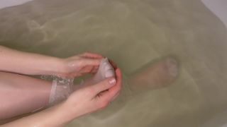 M@nyV1ds - AnnaManyVids - Anna washes her feet in white socks
