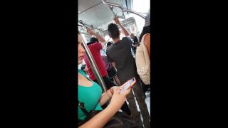 Busty girl from within public transport public 