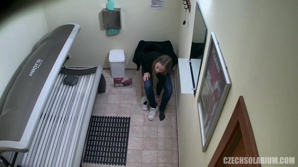 clip 12  Young pussycat enjoying the solarium, hidden camera on webcam