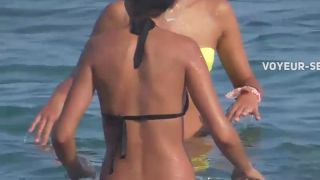 Bubbly butt cheeks falling out of bikini