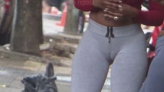 Cameltoe shows ghetto girl's phat pussy