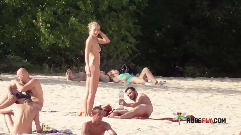 Lovely teens bare their bodies at a naturist  plage